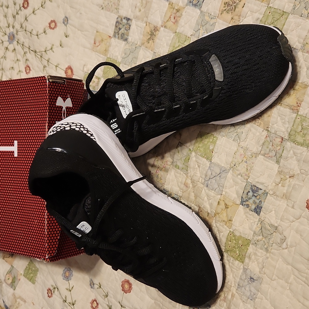 Under Armour running shoes size 7 NWOT.